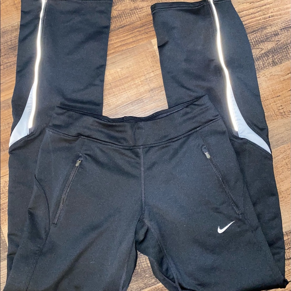 NIKE FIT DRY, SIZE XS (0-2), Black with reflective strip along zippered ankles - Picture 4 of 4